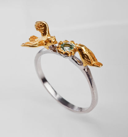 14K Gold Aquamarine Two Birds Ring, worn on hand