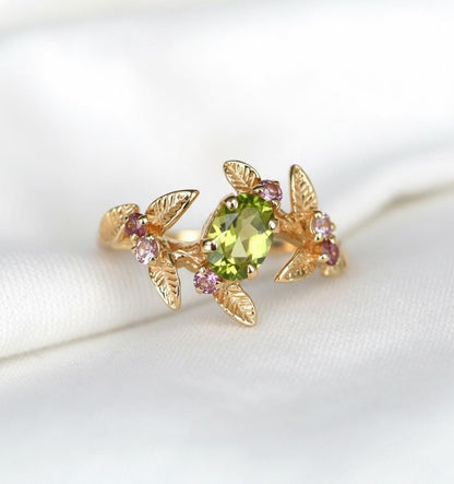 14K Solid Gold Green Peridot Spinel Ring, worn on hand