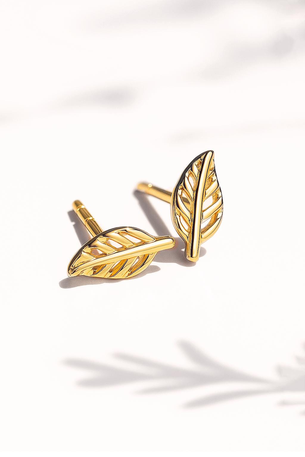 14K Solid Gold Leaf Stud Earrings, worn look