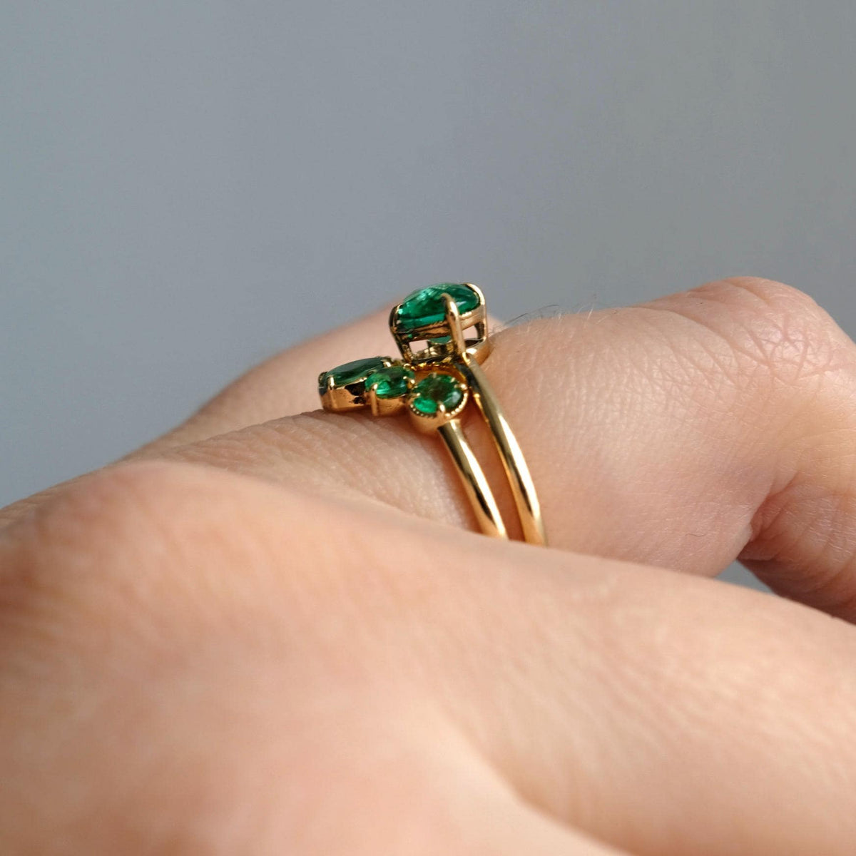 18K Solid Gold Emerald Ring Set, worn on hand
