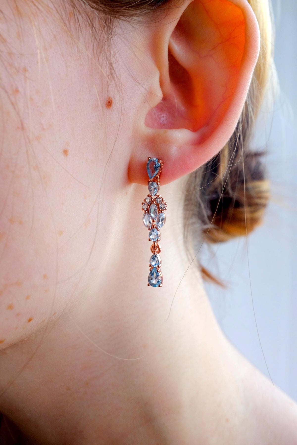 925 Sterling Silver Blue Topaz Earrings, side angle
