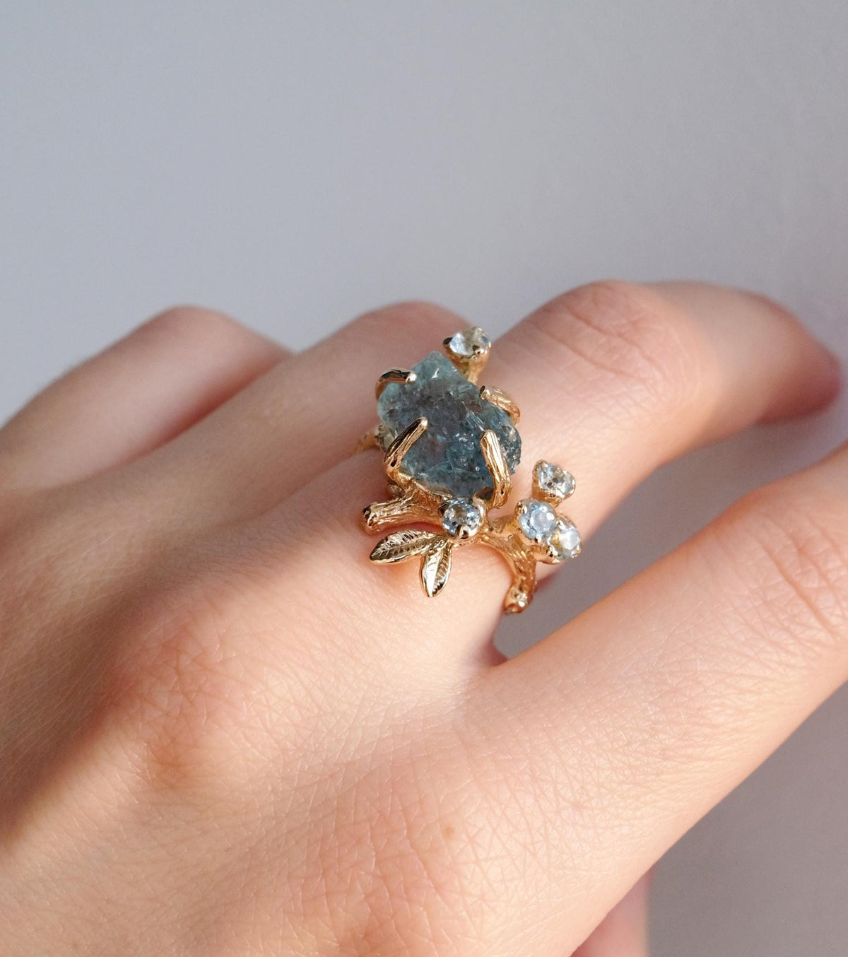 14K Solid Gold Raw Aquamarine Ring, worn on hand