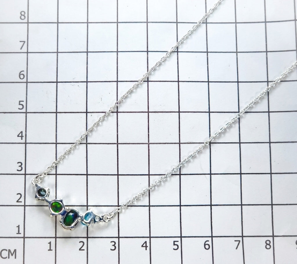 925 sterling silver cluster black opal necklace, worn view