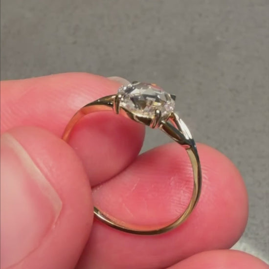 a video of the minimalist engagement rose cut ring in 14K gold with leaf like shaped band