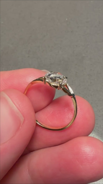a video of the minimalist engagement rose cut ring in 14K gold with leaf like shaped band